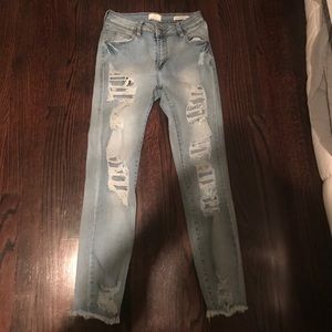 Distressed denim skinny jeans